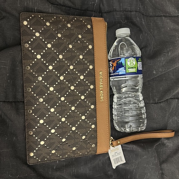 Michael Kors large perf zip clutch new with tag. - Picture 4 of 6